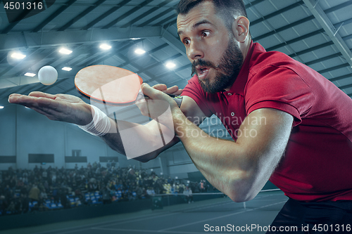 Image of The table tennis player serving