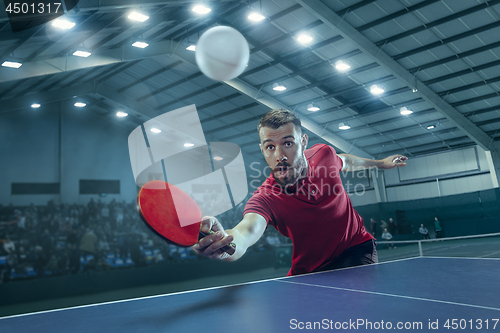 Image of The table tennis player serving