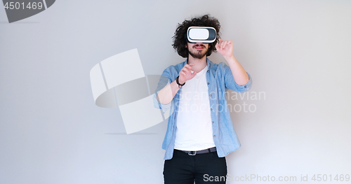 Image of Man using headset of virtual reality