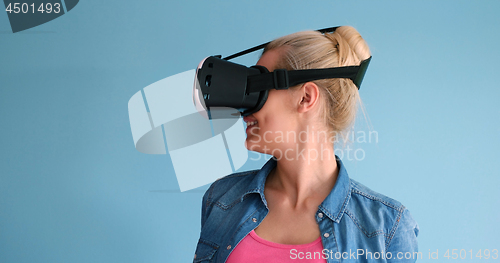 Image of woman using VR headset glasses of virtual reality