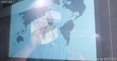 Image of man using VR-headset glasses of virtual reality