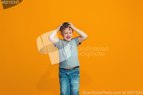 Image of The squint eyed teen boy with weird expression