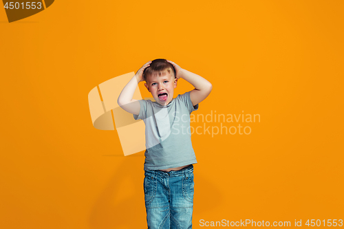 Image of The squint eyed teen boy with weird expression