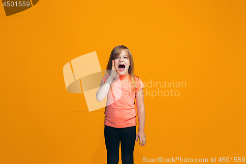 Image of Isolated on pink young casual teen girl shouting at studio