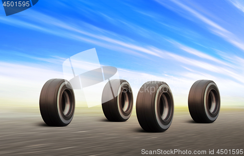 Image of black wheels rush on speed road