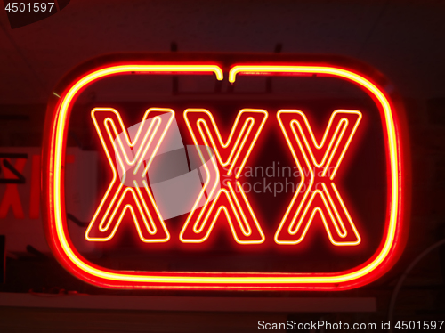 Image of neon sign of adult night life 