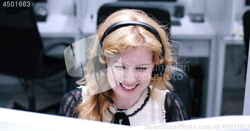 Image of female call centre operator doing her job