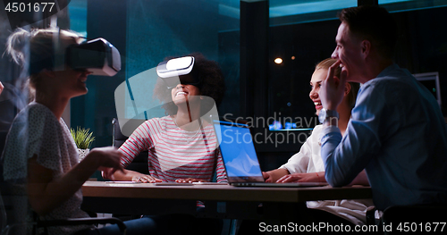 Image of Multiethnic Business team using virtual reality headset