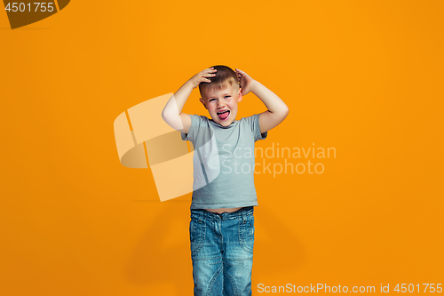 Image of The squint eyed teen boy with weird expression