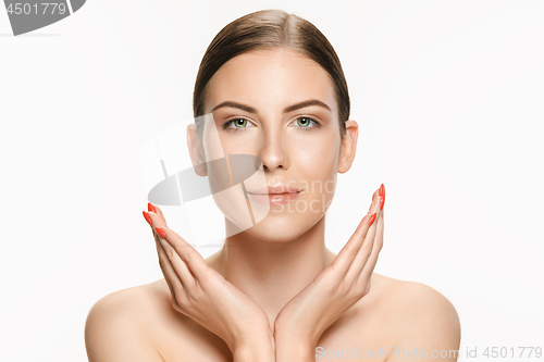 Image of Beautiful face of young adult woman with clean fresh skin isolated on white