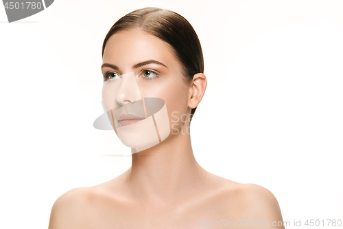 Image of Beautiful face of young adult woman with clean fresh skin isolated on white