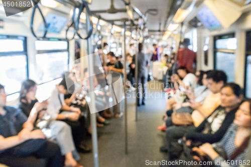 Image of Blured image of unrecognizable asian people commuting by city subway.