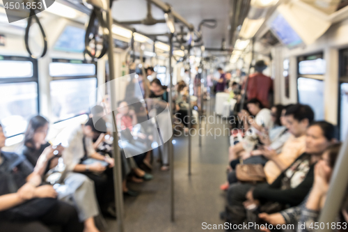 Image of Blured image of unrecognizable asian people commuting by city subway.