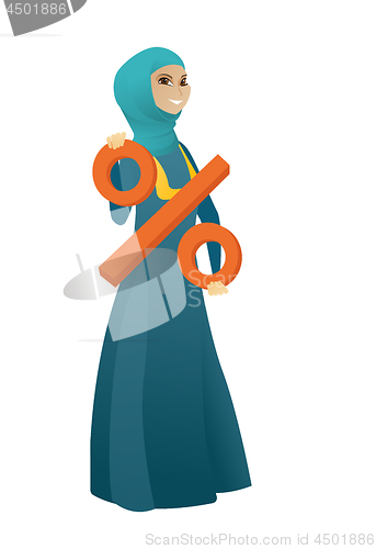 Image of Smiling business woman holding percent sign.