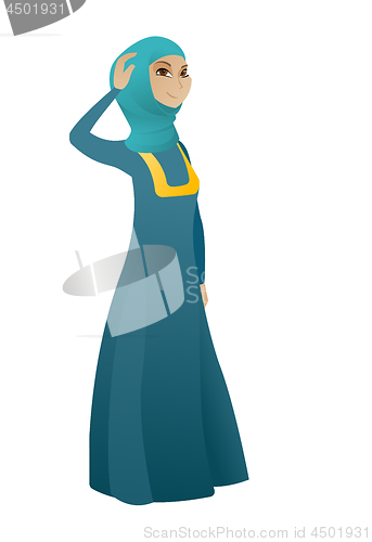 Image of Young muslim business woman scratching her head