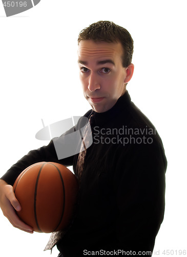 Image of Businessman Holding Basketball
