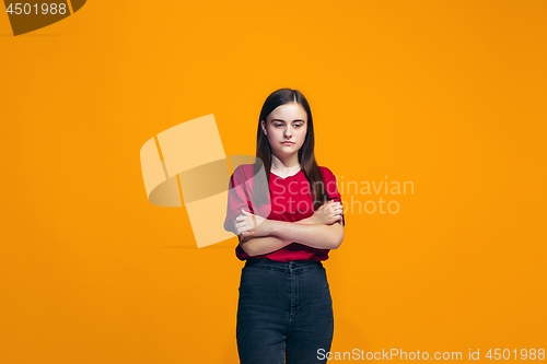 Image of Young serious thoughtful teen girl. Doubt concept.