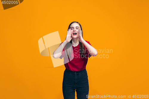 Image of Isolated on pink young casual teen girl shouting at studio