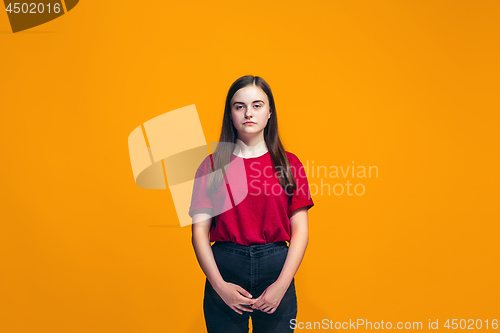 Image of Young serious thoughtful teen girl. Doubt concept.