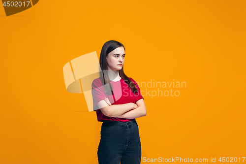 Image of Young serious thoughtful teen girl. Doubt concept.