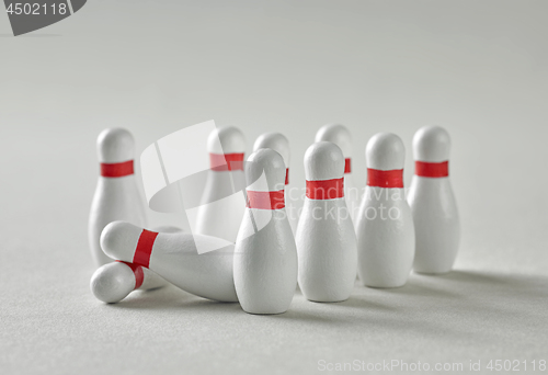 Image of bowling pins on grey background