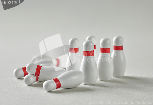 Image of bowling pins on grey background