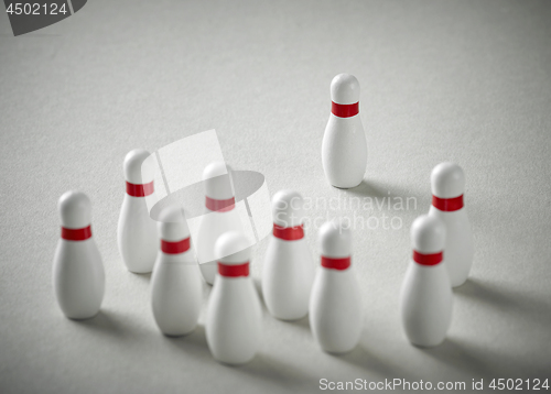 Image of bowling pins on grey background