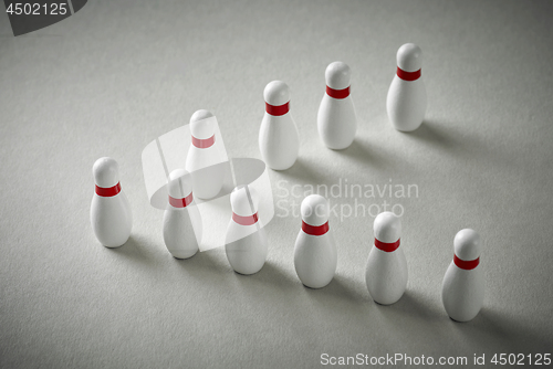 Image of bowling pins on grey background