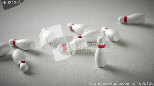 Image of bowling pins on grey background