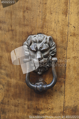 Image of Ancient italian lion shaped door knocker.