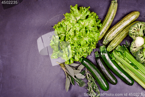 Image of Variety of green organic vegetables. Clean eating food concept.