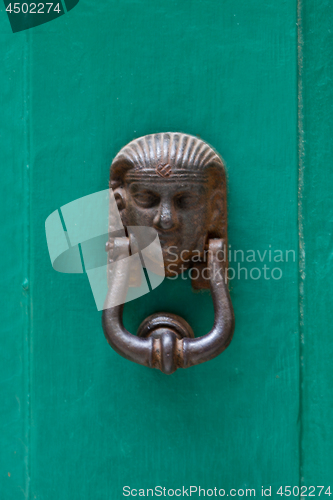 Image of Ancient italian door knocker.