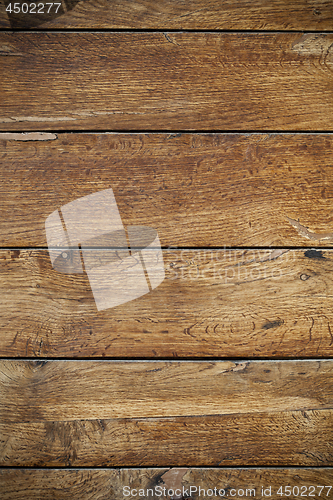 Image of Brown wooden grunge door texture.