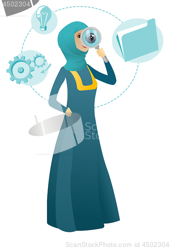 Image of Muslim business woman with magnifying glass.