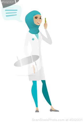 Image of Young muslim doctor with speech bubble.