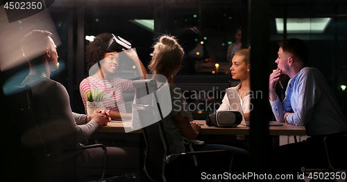 Image of Multiethnic Business team using virtual reality headset