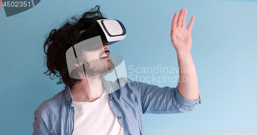 Image of man using VR headset glasses of virtual reality