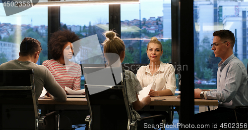 Image of Multiethnic Business Team At A Meeting at modern office building