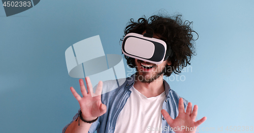 Image of man using VR headset glasses of virtual reality