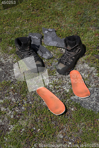 Image of wet shoes drying