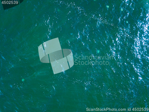 Image of Areal view of pure turquoise ocean water in a summer day. Natural background with space for text.