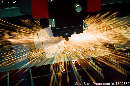 Image of CNC Laser cutting of metal, modern industrial technology.