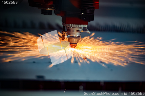 Image of CNC Laser cutting of metal, modern industrial technology.