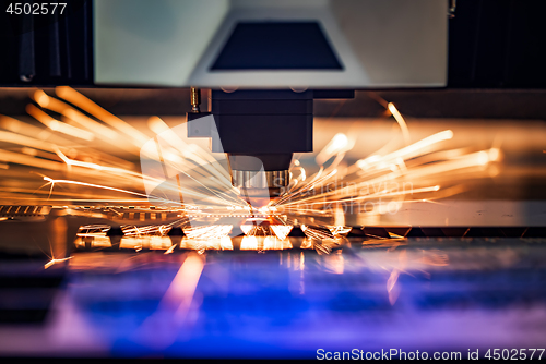 Image of CNC Laser cutting of metal, modern industrial technology.