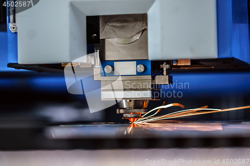 Image of CNC Laser cutting of metal, modern industrial technology.
