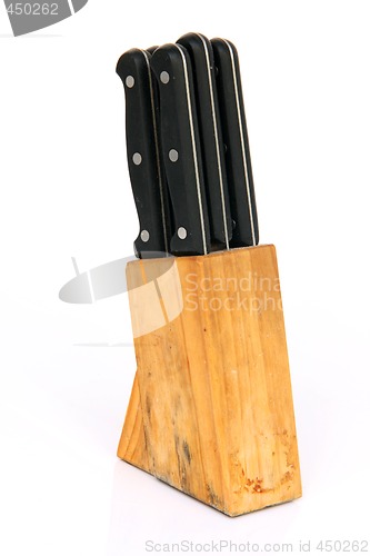 Image of knifes in wooden base