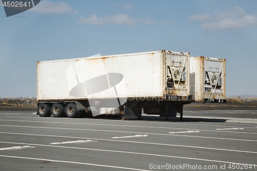 Image of Container carrier trailers parked