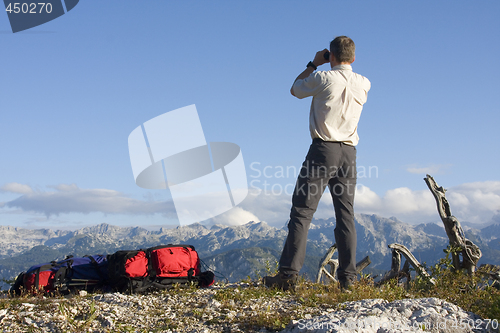 Image of Mountaineer looking through field glasses