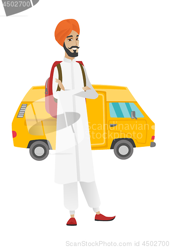 Image of Traveler standing on the background of minibus.