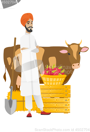 Image of Farmer standing with crossed arms near cow.